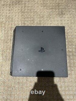 Console de jeu vidéo Sony PlayStation 4 Pro 1To en très bon état