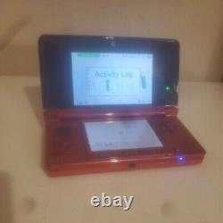 Console portable Nintendo 3DS Flame Red avec chargeur, bon état
