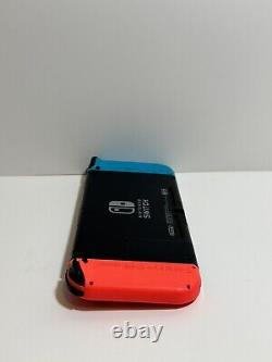 Console portable Nintendo Switch V2 32Go bleu/rouge en très bon état