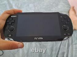 Modèle noir SONY PS Vita PCH-1001 en bon état avec chargeur