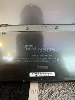 Nintendo 3DS XL Noir d'occasion en bon état avec chargeur testé et fonctionne
