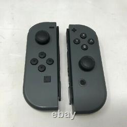 Nintendo Switch Grey 32 Go Très Bon État + Dock + Grey Joy-cons + Câbles