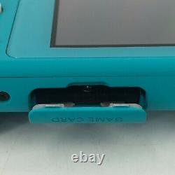 Nintendo Switch Lite Turquoise 32 Go Bon État Avec Chargeur