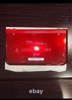 Nouvelle console Nintendo 3DS XL rouge métallique. Chargeur. 2 jeux. Bon état. États-Unis