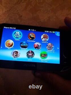PS Vita PCH-1100 256 Go 6500 jeux FW 3.65, bon état
