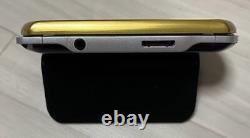 SONY PSP go noir piano en bon état avec une couverture dorée. Consoles de jeux uniquement.