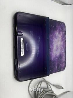Système de jeu portable Nintendo New 3DS XL Édition Galaxy Violet. Bon état.